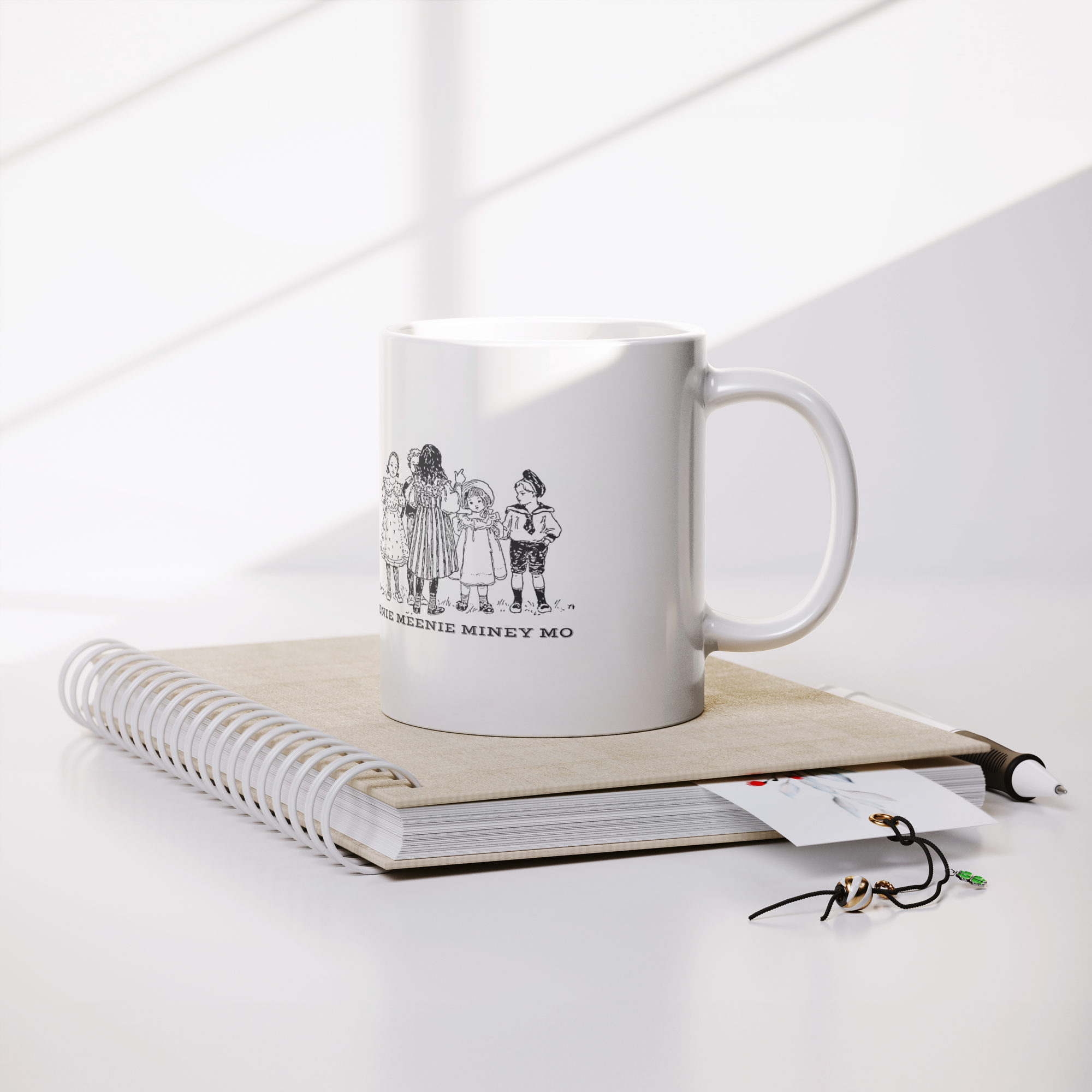 Eeeny_Meeny_Miny_Moe_Mug_Lifestyle_Notebook_Mockup.png_15684021